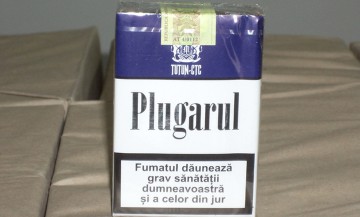 Mii de pachete cu ţigări de contrabandă, confiscate de poliţişti